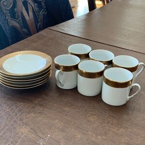 Elegant Gold and White Dinnerware Set. Small cups to drink coffee or tea